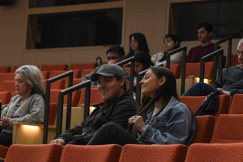 Two EFFY participants sitting in the crowd. 
