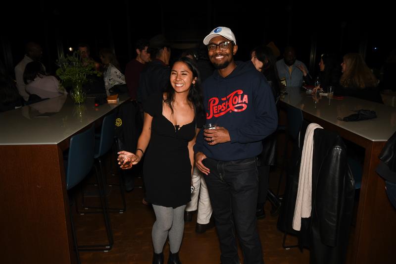 Two participants at the afterparty