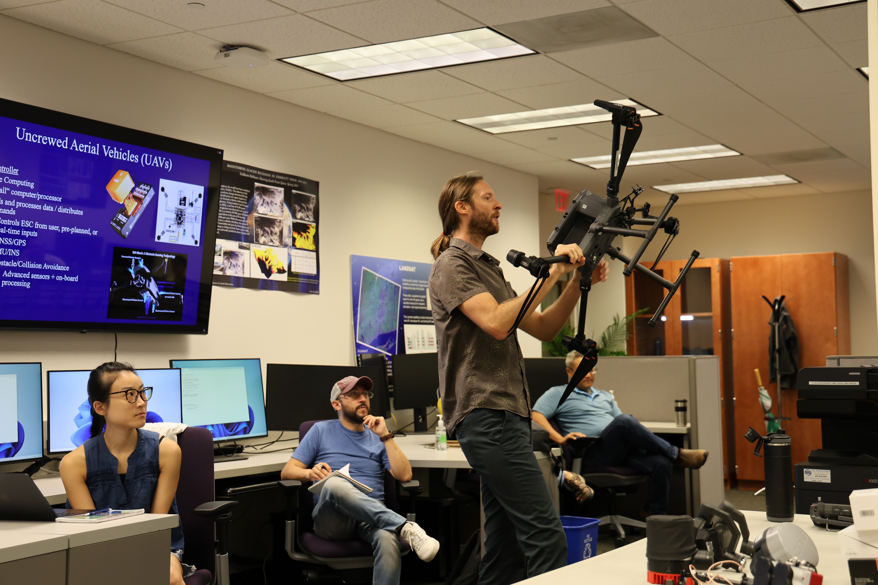 Austin carrying a drone