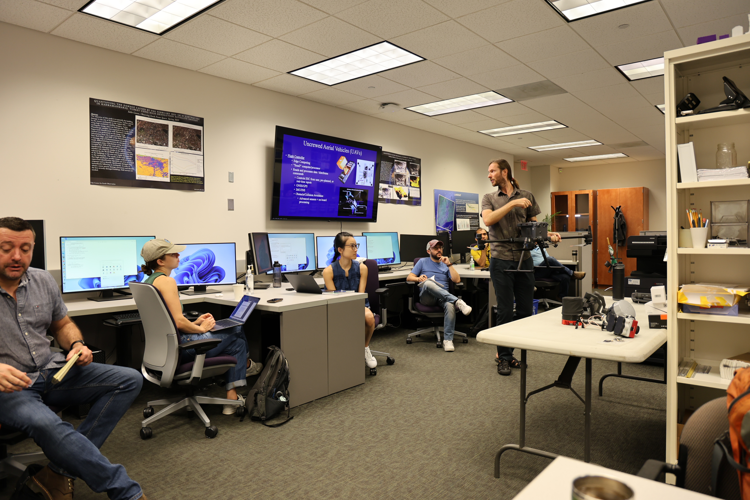 Students listening to drone workshop
