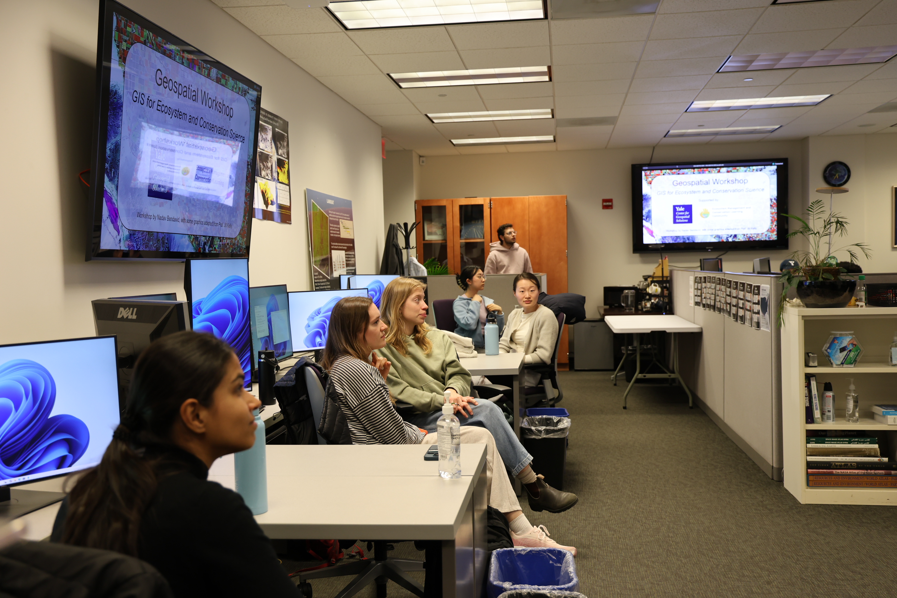 Students listening to Davi's session