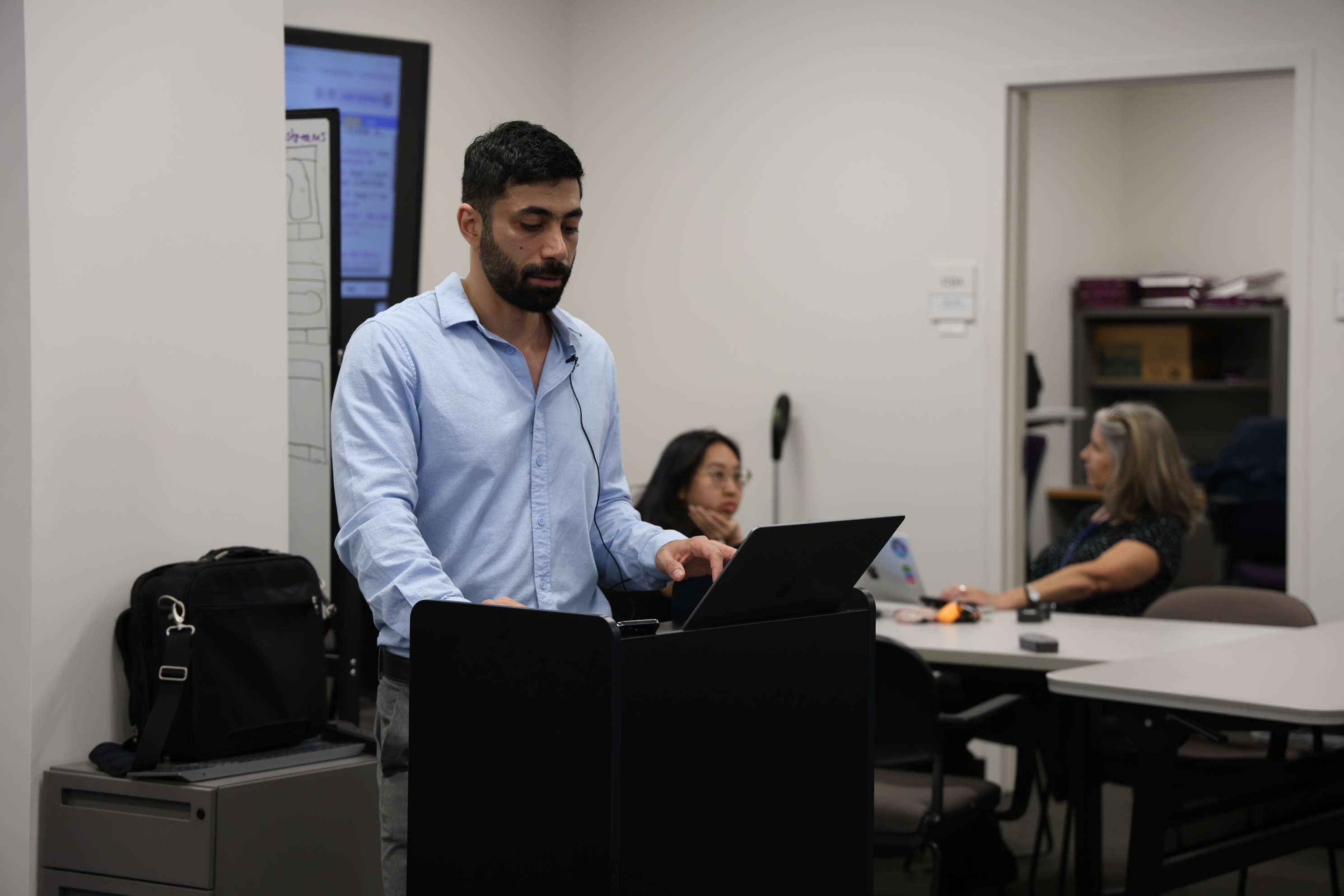 Esmaeel teaching students